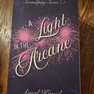 A Light in the Arcane Book by Amal Kamal